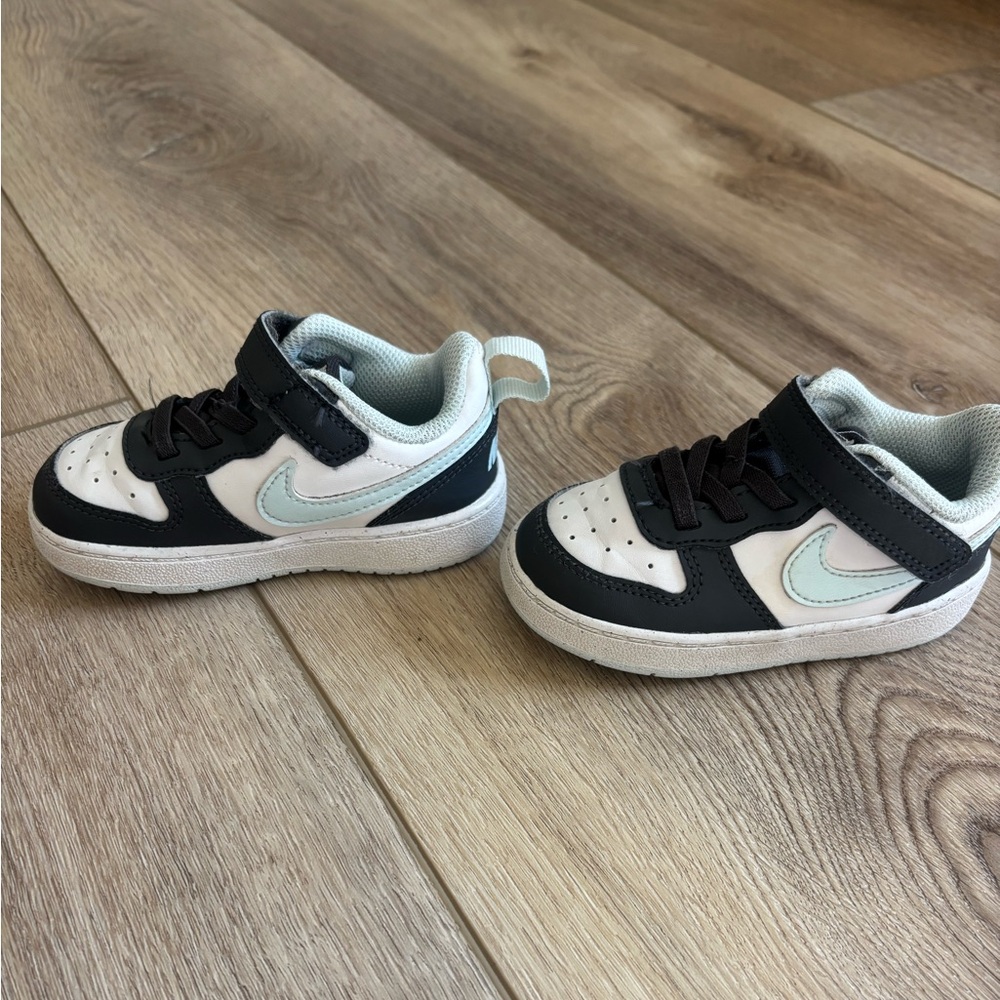 Nike Kids Black and White Sneakers with Blue Swoosh
